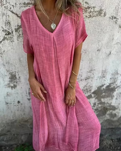 Vestido midi com decote em V em algodão e linho. 