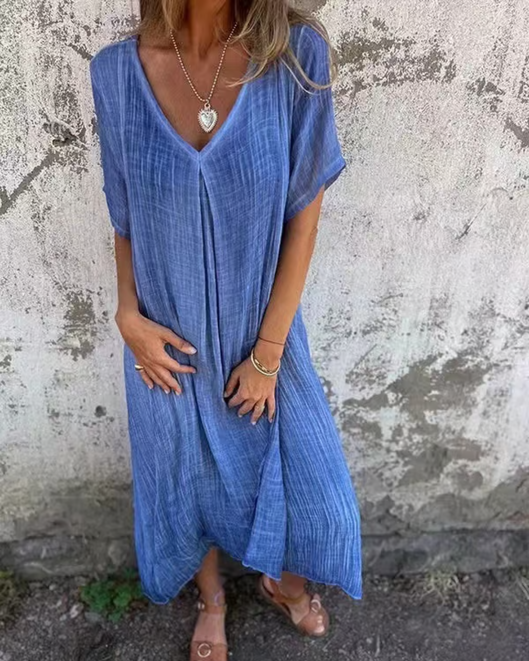 Vestido midi com decote em V em algodão e linho. 