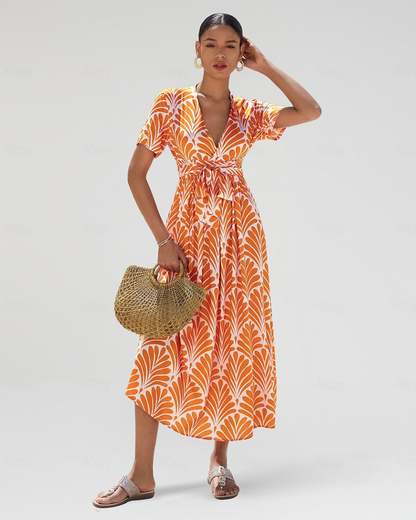 Vestido midi em rayon com cinto geométrico. 