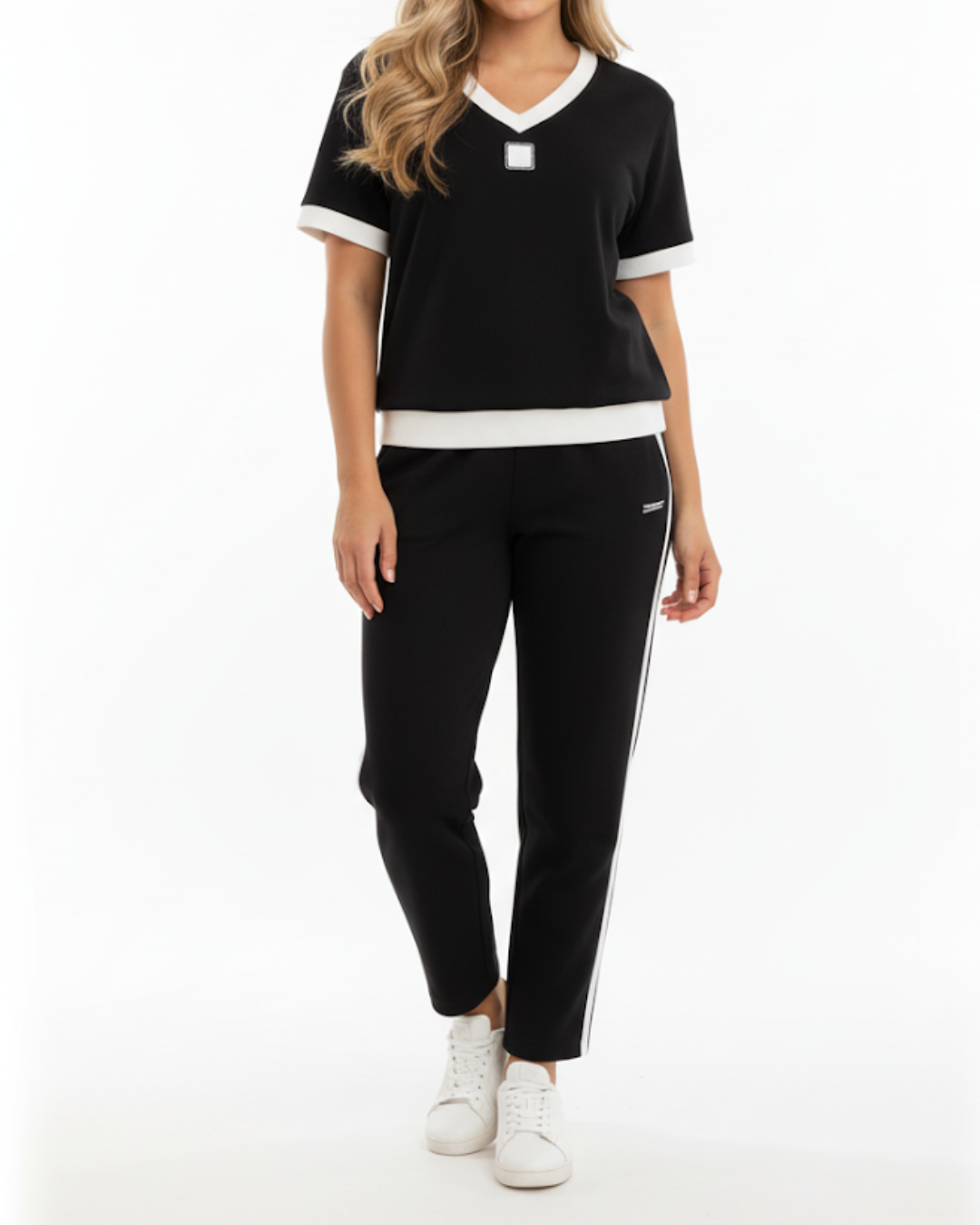 Elegante conjunto de top e collants com decote em V. 