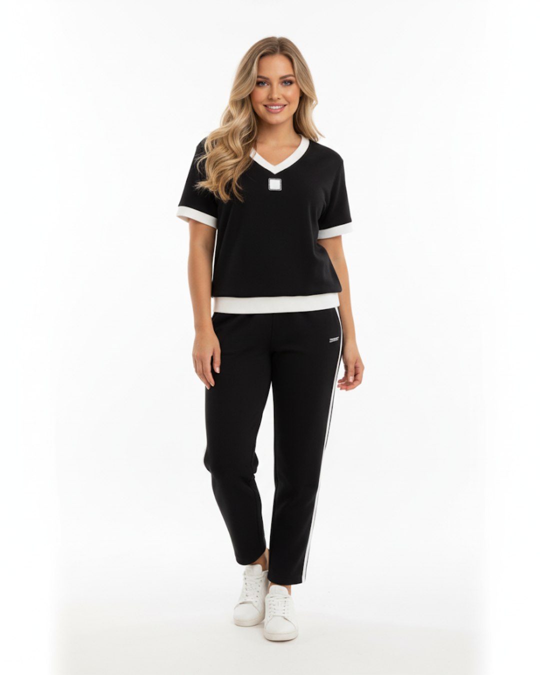 Elegante conjunto de top e collants com decote em V. 